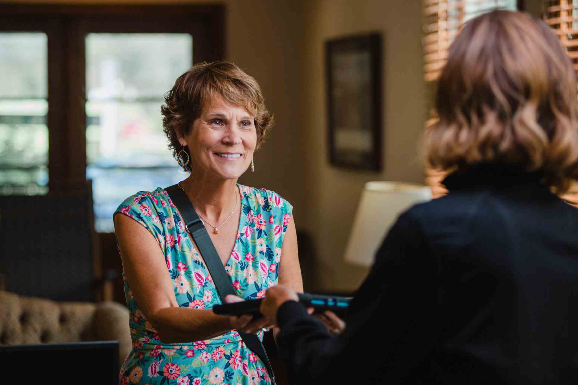 Woman Getting iPad to Start Treatment